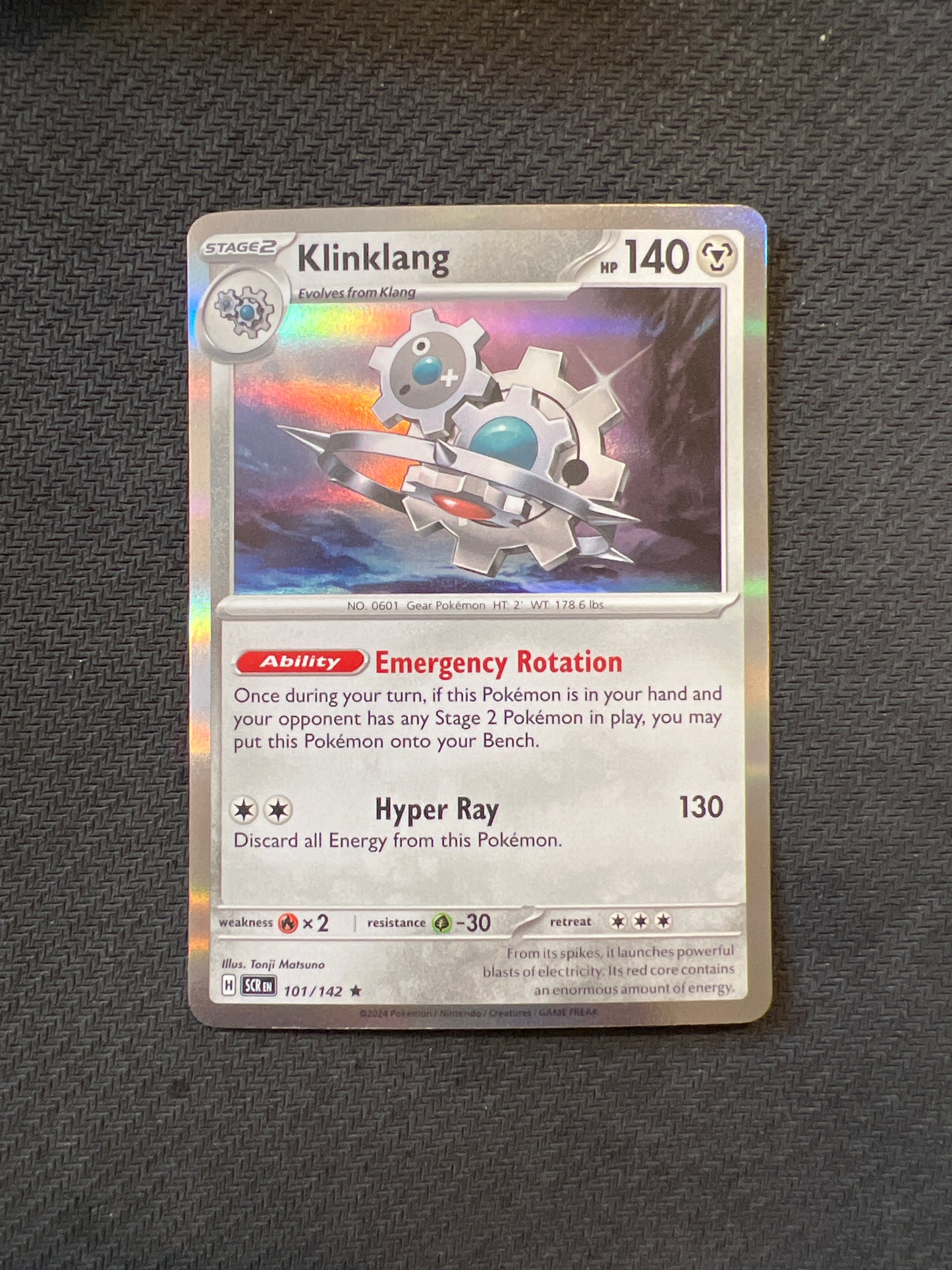 Pokemon: Klinklang 101/142 - Stellar Crown (Holo Rare) NM
