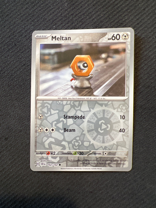 Pokemon: Meltan 102/142 - Stellar Crown (Reverse Holo Common) NM